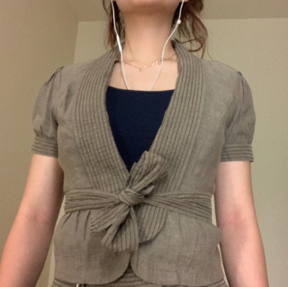 Candies, miss green blouse with a lined design.